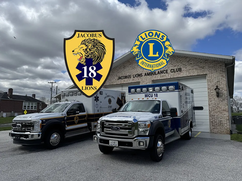 Jacobus Lions Club ambulances in front of the building